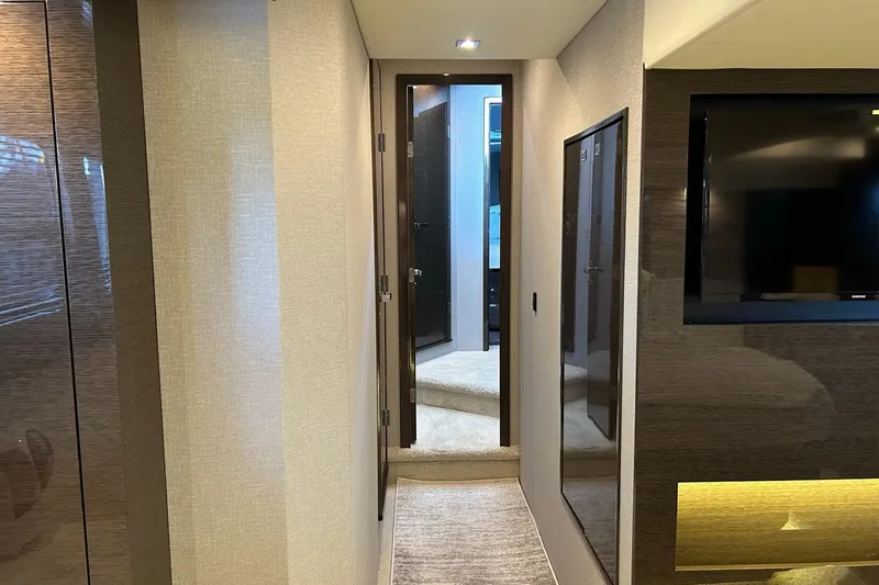 Slide: The Image of Interior hallway of 2021 Cruisers Yachts 50 Cantius, featuring modern design and sleek finishes. - 77