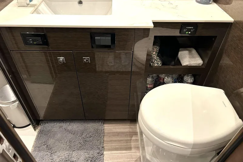 Slide: The Image of Luxury bathroom in 2021 Cruisers Yachts 50 Cantius with modern fixtures and storage. - 79