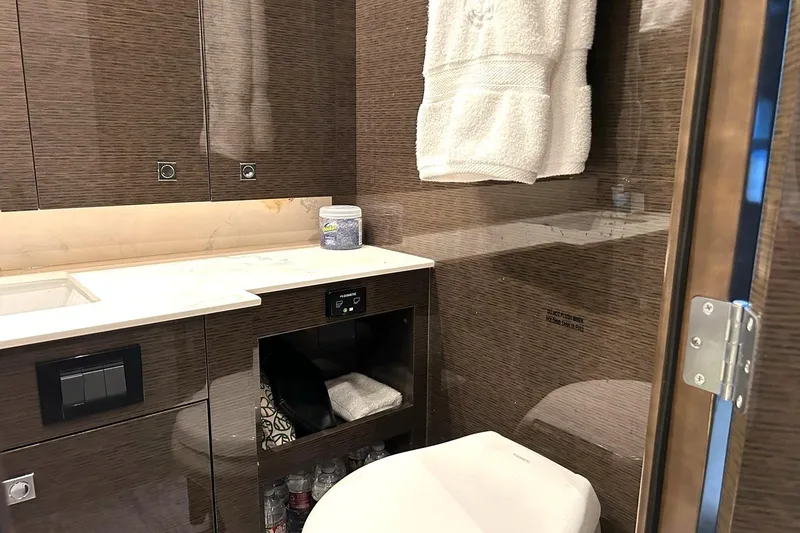 Slide: The Image of Luxurious bathroom in 2021 Cruisers Yachts 50 Cantius with modern fixtures and elegant design. - 80