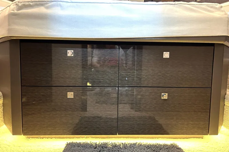 Slide: The Image of Luxurious interior of 2021 Cruisers Yachts 50 Cantius with sleek wooden cabinetry. - 86