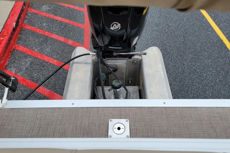 Slide: The Image of 2024 Sun Tracker Party Barge 20 DLX pontoon boat engine view. - 7