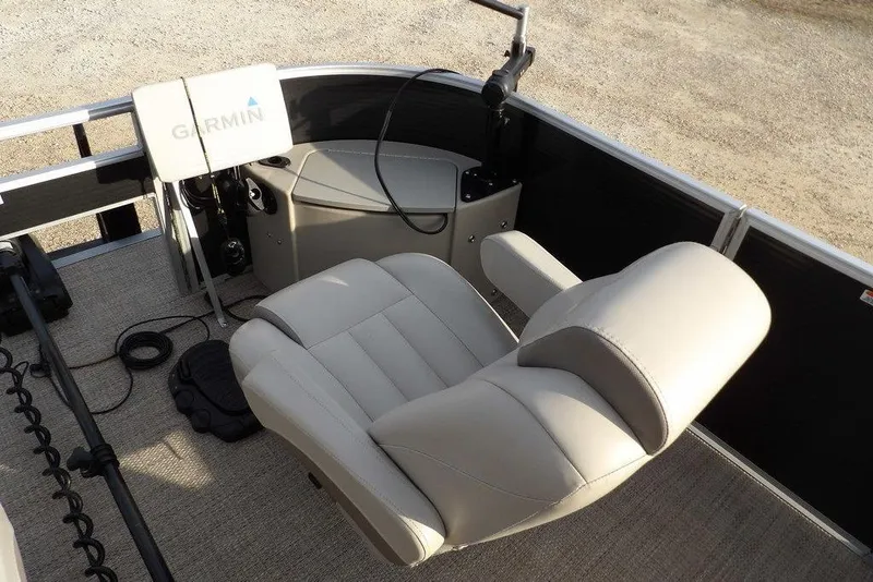 Slide: The Image of 2018 Bennington 23SF boat interior with Garmin equipment and comfortable seating. - 15