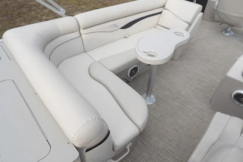 Slide: The Image of Luxurious seating area on a 2018 Bennington 23SF pontoon boat with beige upholstery. - 41