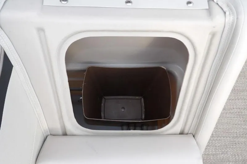 Slide: The Image of Storage compartment in 2018 Bennington 23SF boat, featuring a built-in container. - 45