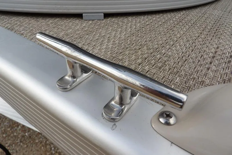 Slide: The Image of Chrome cleat on 2018 Bennington 23SF boat deck with textured surface. - 58