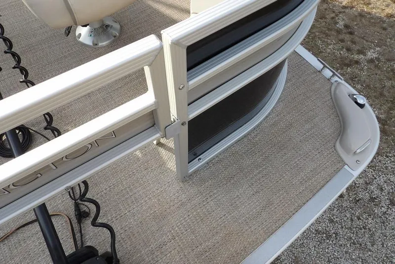 Slide: The Image of 2018 Bennington 23SF pontoon boat deck with railing and carpeted flooring. - 70