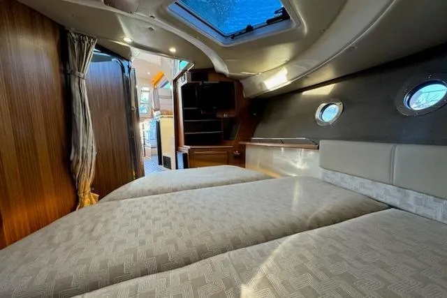 Slide: The Image of Interior of 2025 Ranger Tug R-29 CB Luxury Edition with cozy cabin and skylight. - 13