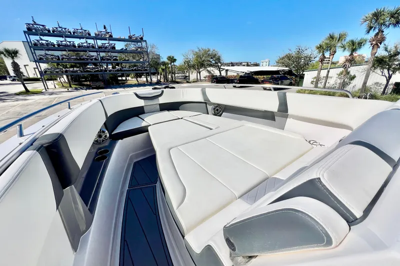 Slide: The Image of 2023 Chaparral 300 OSX boat interior with spacious seating and modern design. - 24
