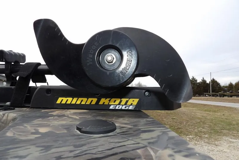 Slide: The Image of Minn Kota Edge motor on 2018 Crestliner 1660 Retriever boat, camo pattern visible. - 20