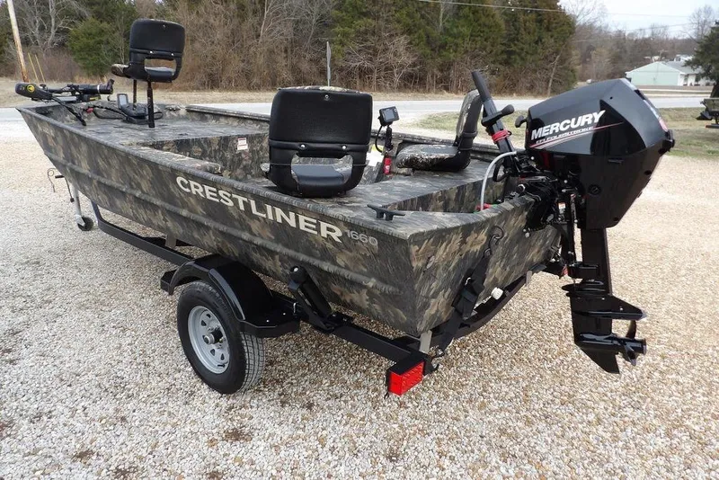 Slide: The Image of 2018 Crestliner 1660 Retriever boat with Mercury outboard motor on a trailer. - 5