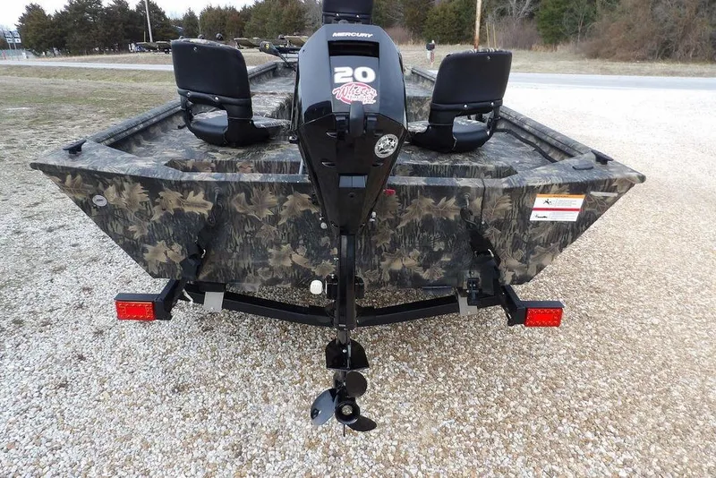 Slide: The Image of 2018 Crestliner 1660 Retriever boat with camouflage design and Mercury 20 HP outboard motor. - 8