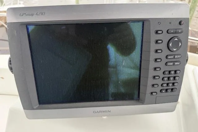 Slide: The Image of Garmin GPSmap 4210 on 1993 Silverton 34 Convertible boat dashboard. - 27