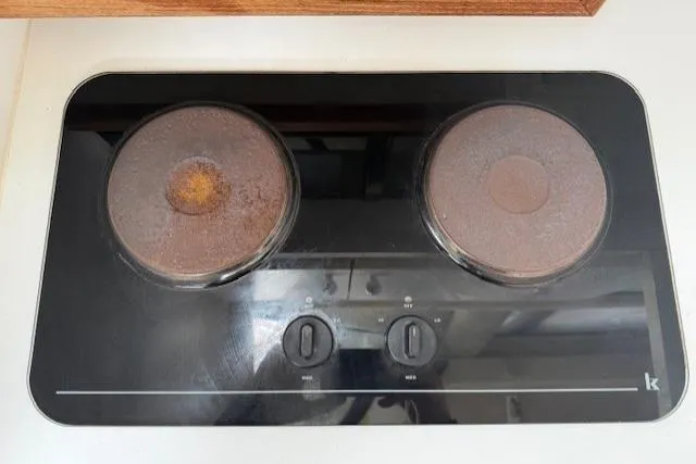 Slide: The Image of Electric stove with two burners on a 1993 Silverton 34 Convertible boat. - 41