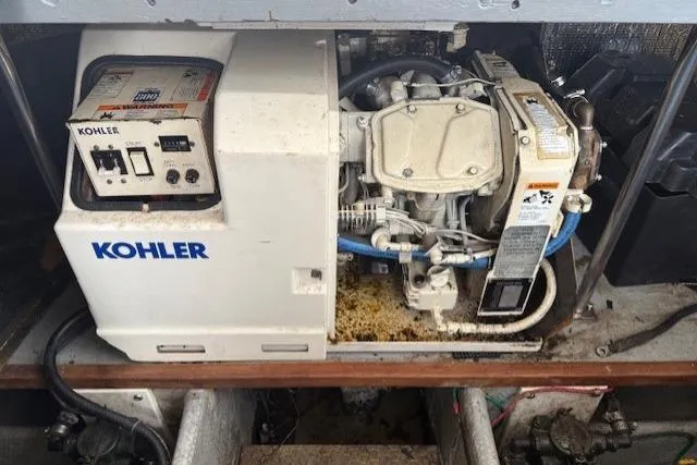 Slide: The Image of Kohler generator in 1993 Silverton 34 Convertible boat engine compartment. - 57