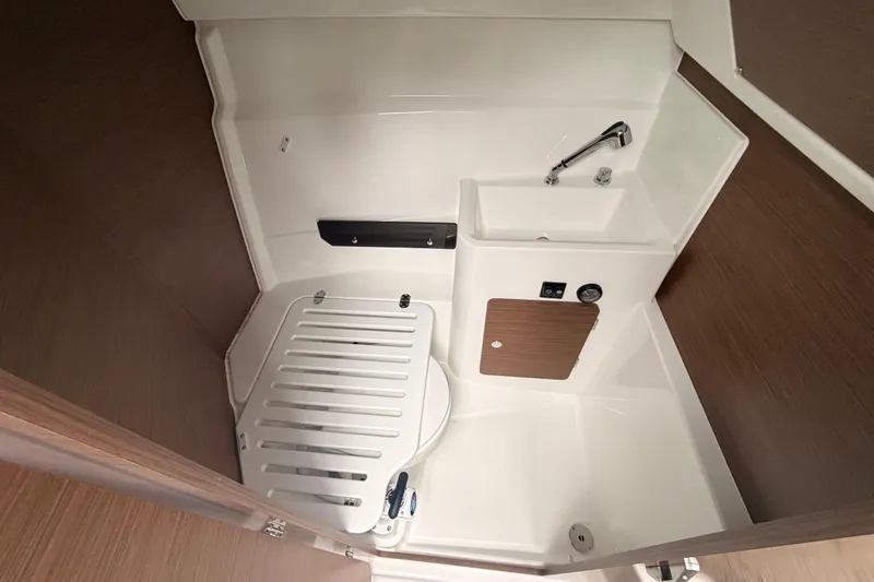 Slide: The Image of 2026 Jeanneau NC Weekender 795 Series 2 boat interior bathroom with sink and shower. - 10