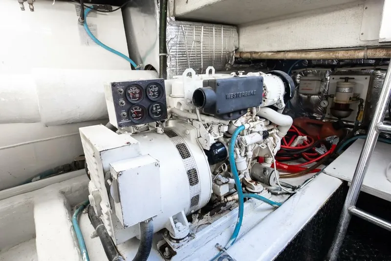 Slide: The Image of Engine room of 1999 Ocean Yachts 48 Super Sport with Westerbeke generator. - 15