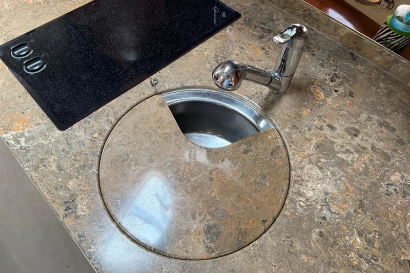 Slide: The Image of Marble countertop with sink and faucet in 2008 Cruisers Yachts 330 Express. - 33