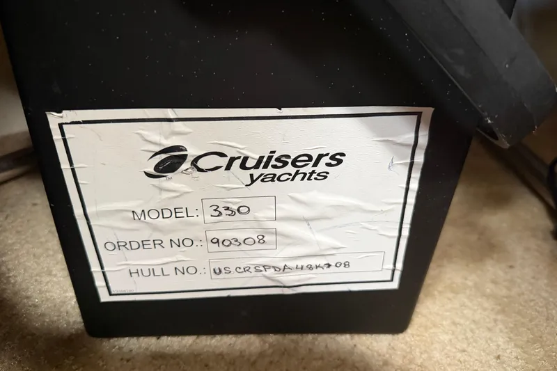 Slide: The Image of Label on 2008 Cruisers Yachts 330 Express, showing model, order, and hull numbers. - 45
