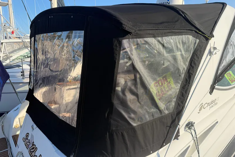 Slide: The Image of 2008 Cruisers Yachts 330 Express with "For Sale" sign, docked at marina. - 52