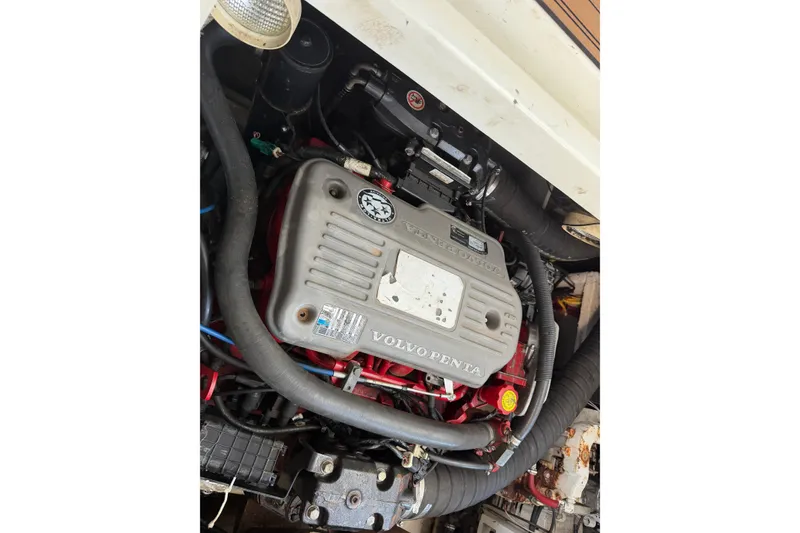 Slide: The Image of Engine compartment of a 2008 Cruisers Yachts 330 Express with Volvo Penta engine. - 57