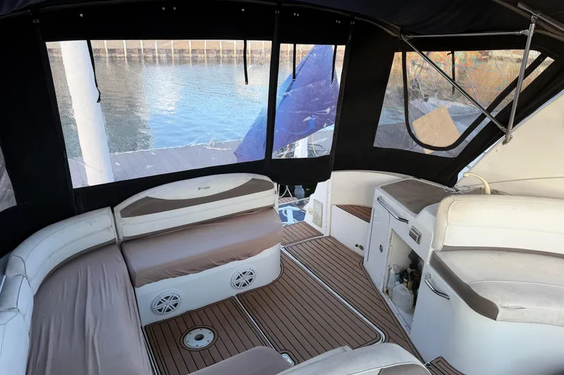 Slide: The Image of 2008 Cruisers Yachts 330 Express interior with seating and water view. - 64