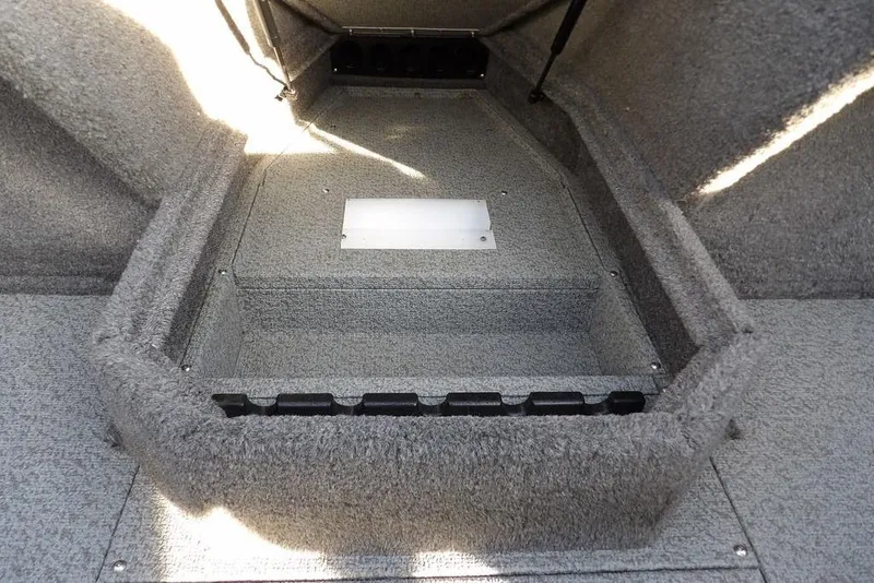 Slide: The Image of Interior view of 2025 Lund 1875 Crossover XS boat storage compartment. - 23