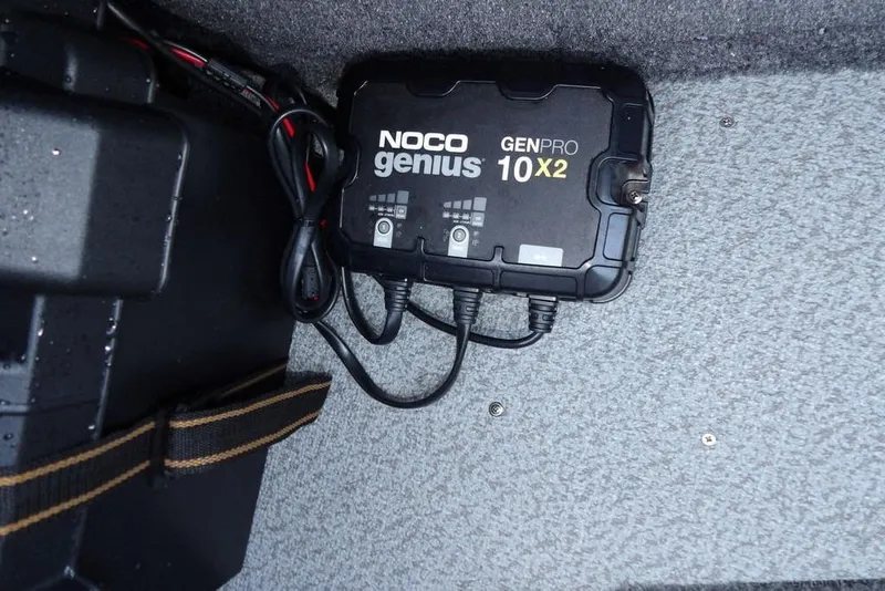 Slide: The Image of NOCO Genius GENPRO 10X2 charger in 2025 Lund 1875 Crossover XS boat. - 28