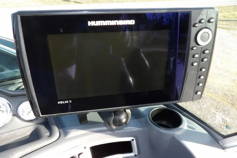 Slide: The Image of Humminbird Helix 9 fish finder on 2025 Lund 1875 Crossover XS dashboard. - 31