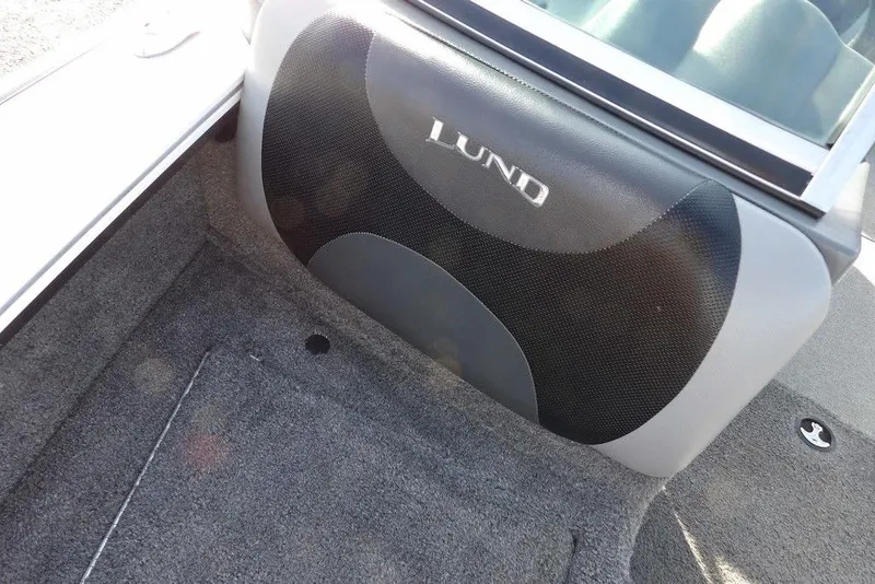 Slide: The Image of 2025 Lund 1875 Crossover XS interior detail with logo on cushioned seat. - 33