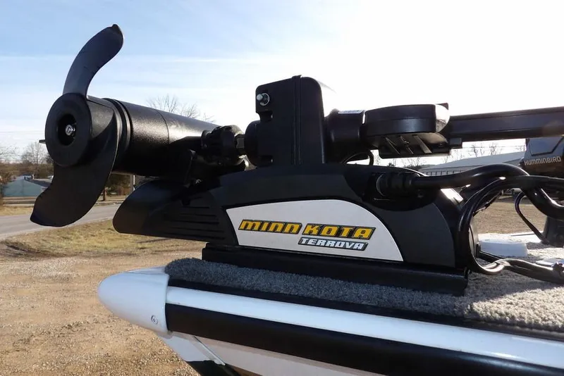 Slide: The Image of Minn Kota Terrova motor on 2025 Lund 1875 Crossover XS boat, outdoor setting. - 40