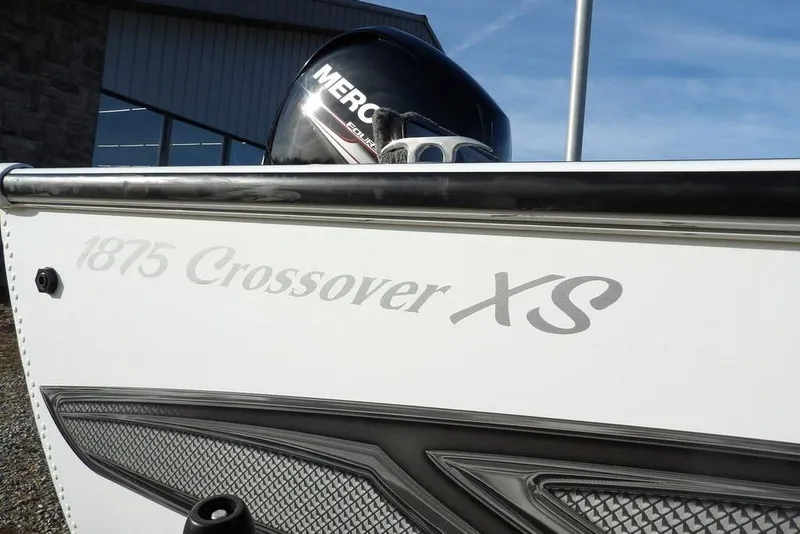 Slide: The Image of 2025 Lund 1875 Crossover XS boat with Mercury engine, exterior view. - 50