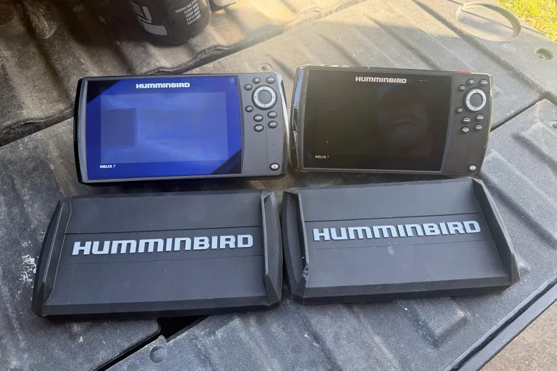Slide: The Image of Two Humminbird Helix 7 fish finders on a 2004 PlayCraft 22 Bay Charger. - 14