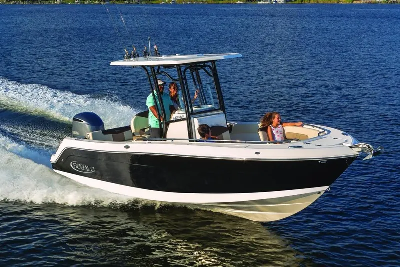 Slide: The Image of Manufacturer Provided Image: 2019 Robalo R242 Explorer boat cruising on open water. - 1