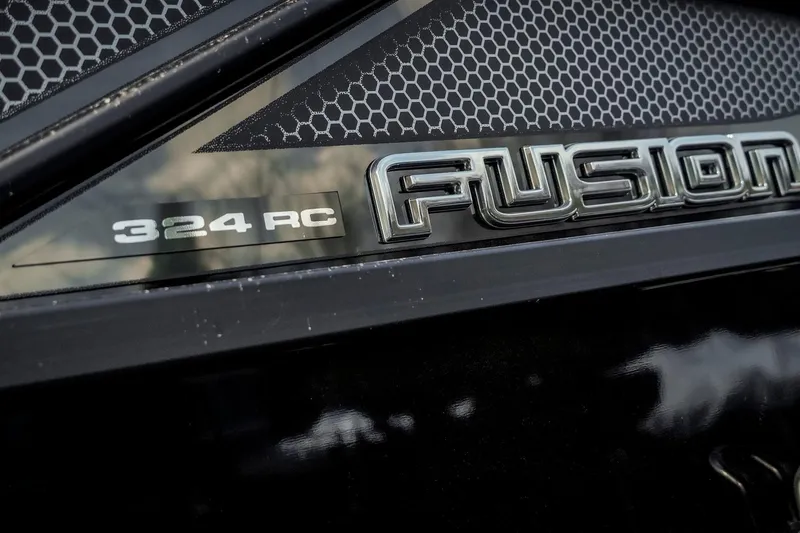 Slide: The Image of Close-up of 2025 SunCatcher Fusion 324RC logo with hexagonal pattern background. - 18