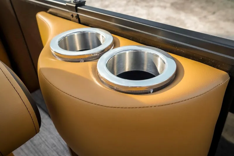 Slide: The Image of Cup holders in SunCatcher Fusion 324RC, 2025 model, featuring sleek design and premium materials. - 25