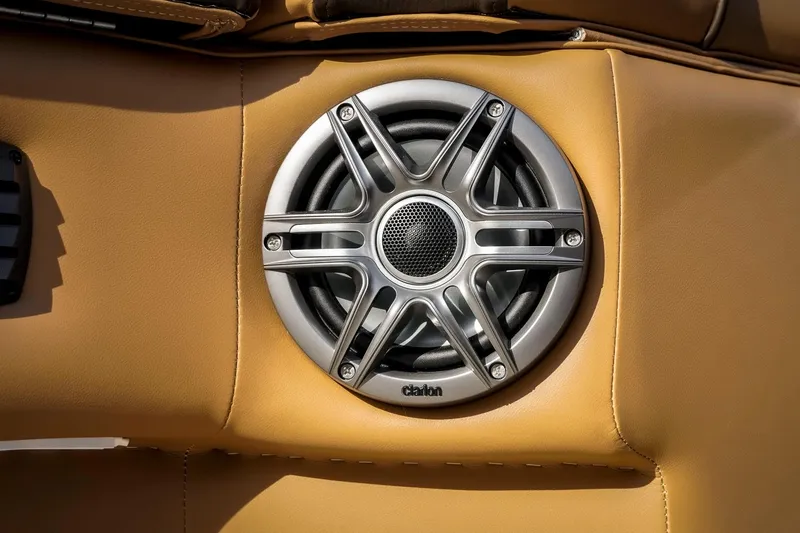 Slide: The Image of Speaker on SunCatcher Fusion 324RC 2025 boat, featuring sleek metallic design. - 27