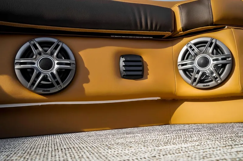 Slide: The Image of Luxury audio system in 2025 SunCatcher Fusion 324RC boat interior. - 28