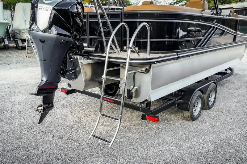 Slide: The Image of 2025 SunCatcher Fusion 324RC pontoon boat with outboard motor and trailer. - 33