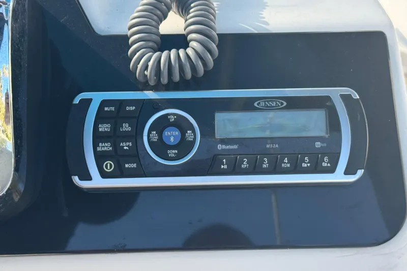 Slide: The Image of 2005 Angler 204 Center Console boat bow view at marina. - 19