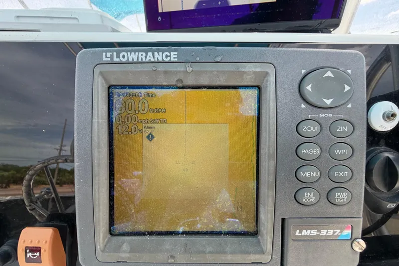 Slide: The Image of Lowrance LMS-337C depth finder on 2005 Angler 204CC boat dashboard. - 26