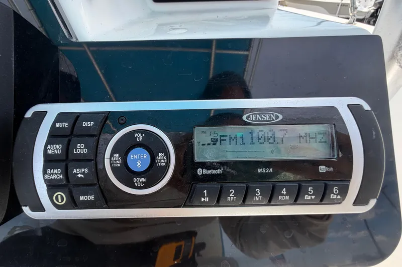 Slide: The Image of Jensen MS2A marine stereo on 2005 Angler 204CC, displaying FM 108.7 MHz. - 29