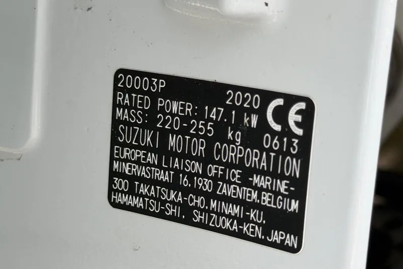 Slide: The Image of Suzuki motor label with specifications for Angler 204CC, 2005 model. - 60
