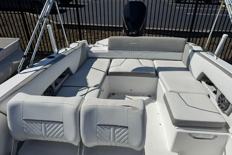 Slide: The Image of 2020 Glastron GTD 240 boat interior with spacious seating and modern design. - 13