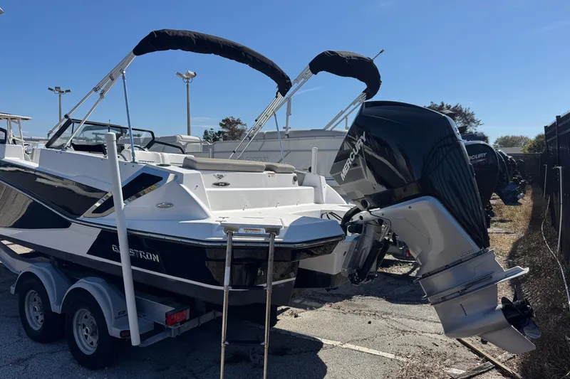 Slide: The Image of 2020 Glastron GTD 240 boat with Mercury outboard engine on trailer. - 4
