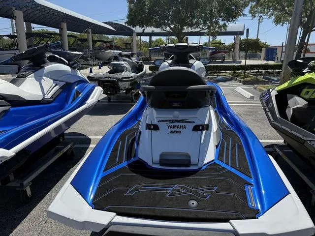 Slide: The Image of 2021 Yamaha WaveRunner FX Cruiser HO in a parking lot. - 7