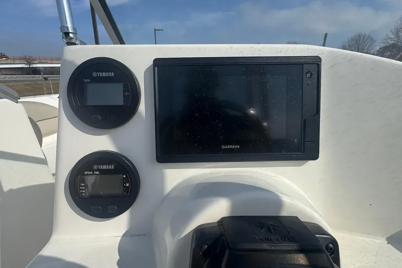 Slide: The Image of Dashboard of 2021 Key West 203 DFS boat with Yamaha gauges and Garmin display. - 12