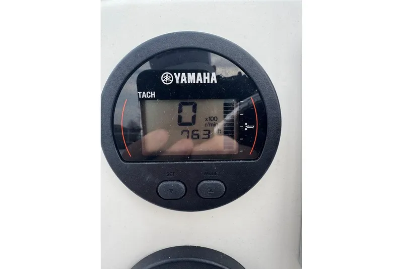 Slide: The Image of Yamaha tachometer display on 2021 Key West 203 DFS boat, showing zero RPM. - 13