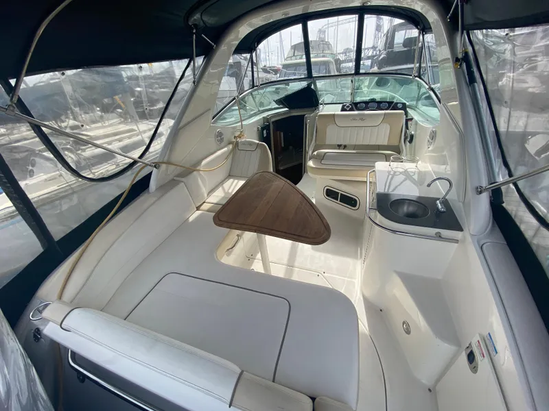 Slide: The Image of Interior of a 2012 Sea Ray Sundancer 280 yacht with seating area. - 10