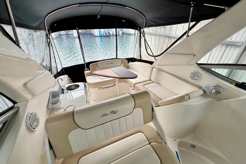 Slide: The Image of Interior of 2012 Sea Ray Sundancer 280 boat with seating and table. - 12