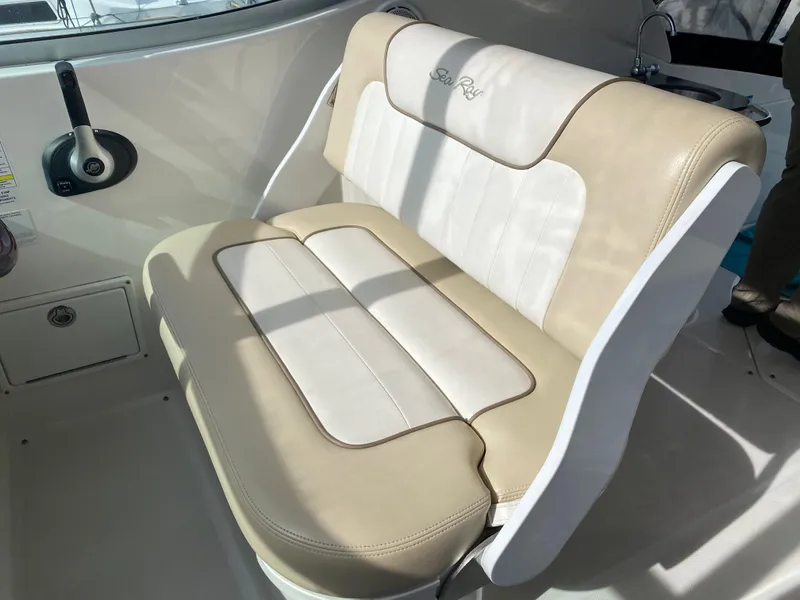Slide: The Image of Beige and white seat cushion on 2012 Sea Ray Sundancer 280. - 16